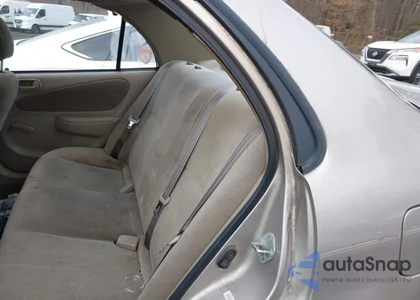 2002 Toyota Corolla Ce из США, поврежденный, VIN 2T1BR12E92C577731